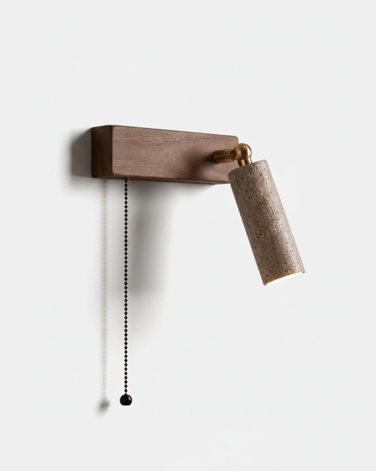 Travertine wall sconce VITRU No.01, cream travertine cylinder on a walnut block, right-hand head with pull chain, unlit