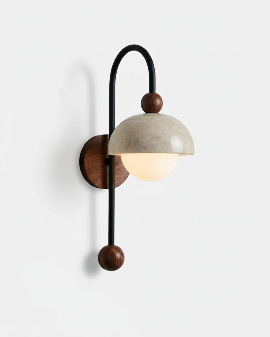 Travertine wall sconce IBLA No.01, arched black iron arm with a travertine dome and lit opal globe
