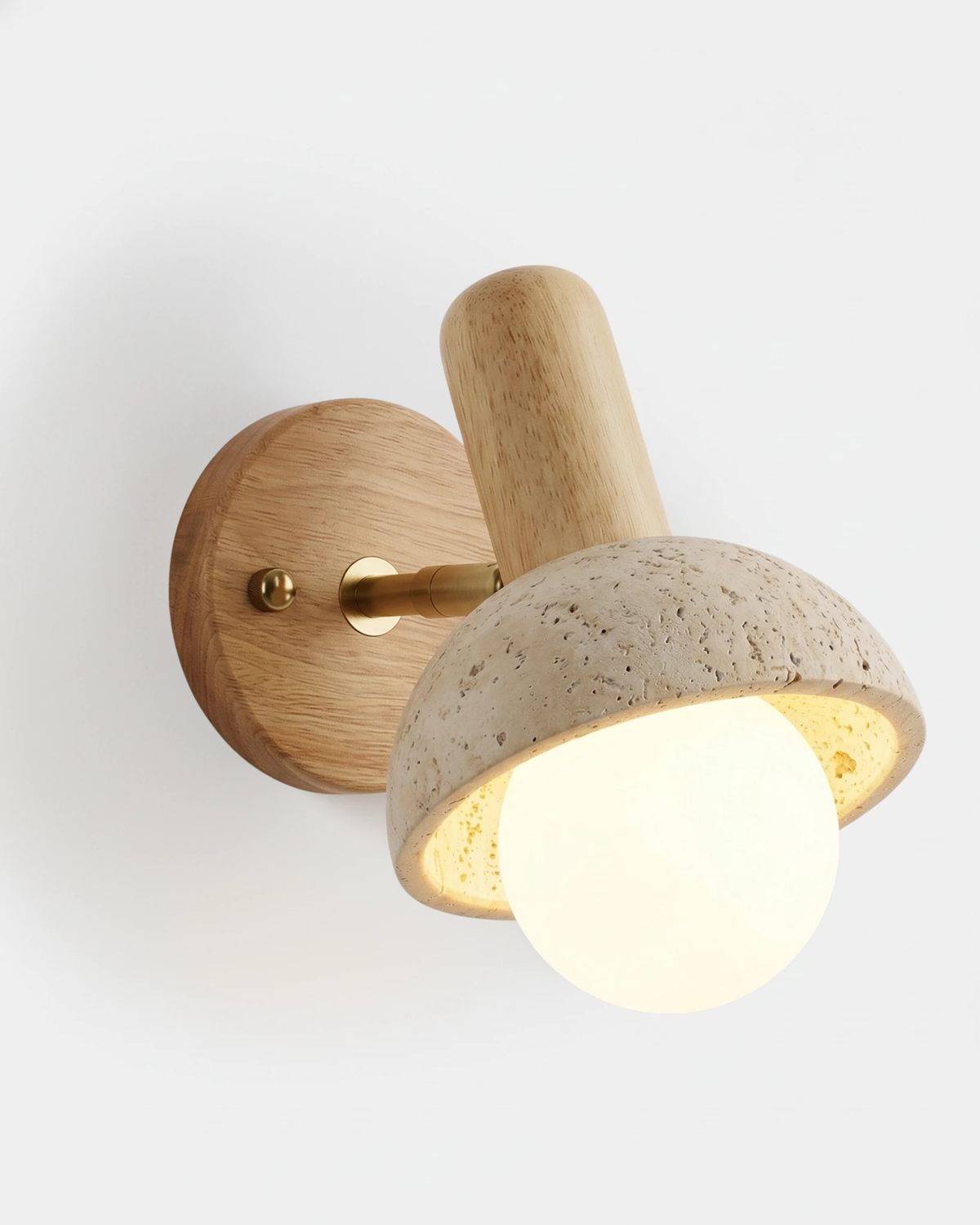 Travertine wall sconce CONA No.01, travertine dome with opal globe on a light oak backplate, switched on