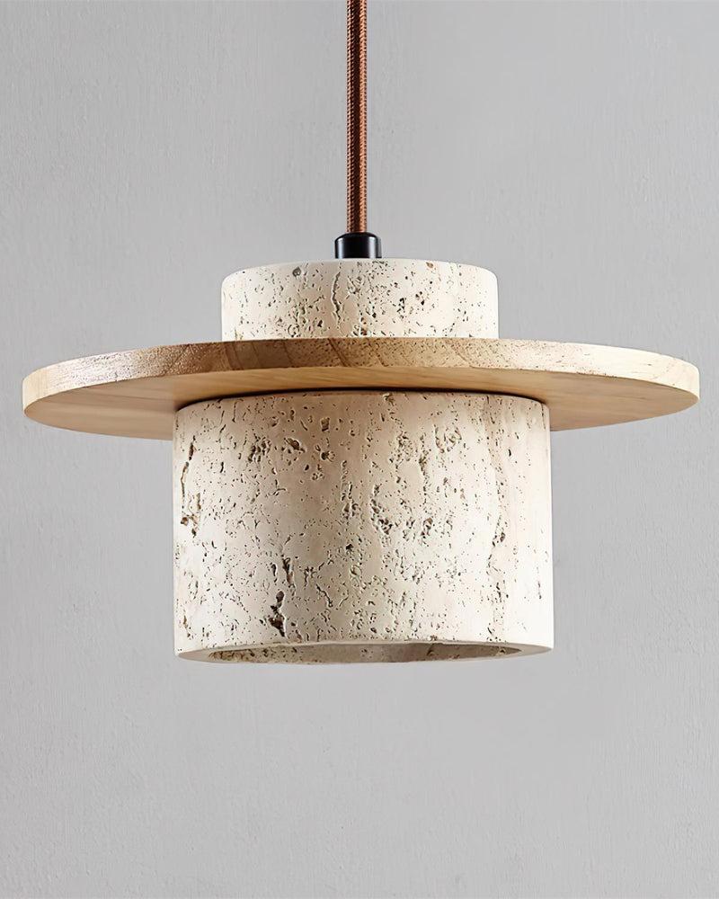 Travertine wall sconce TIVOLI No.01 shade shown hanging on a braided cord, oak disc over a lit travertine cylinder