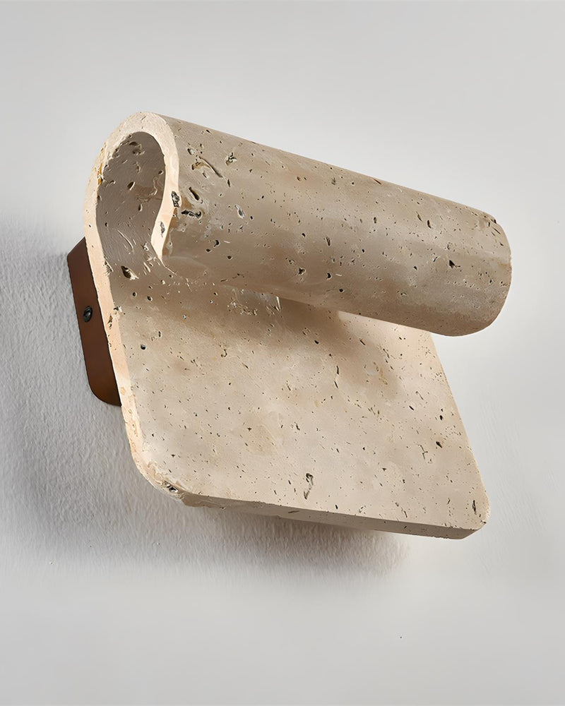 Travertine wall sconce RIVA No.01, curled cream travertine slab on a walnut backplate, unlit angled view
