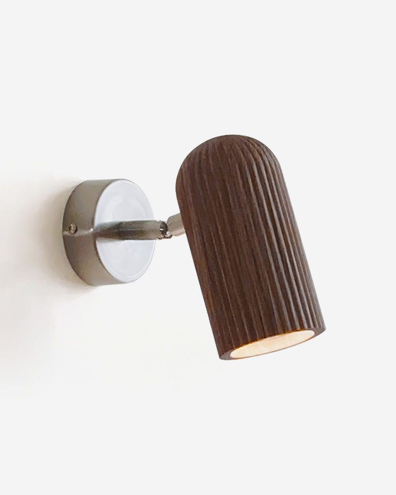 Wood wall sconce NOTA No.01 in walnut with nickel, fluted walnut cylinder angled on a round nickel plate