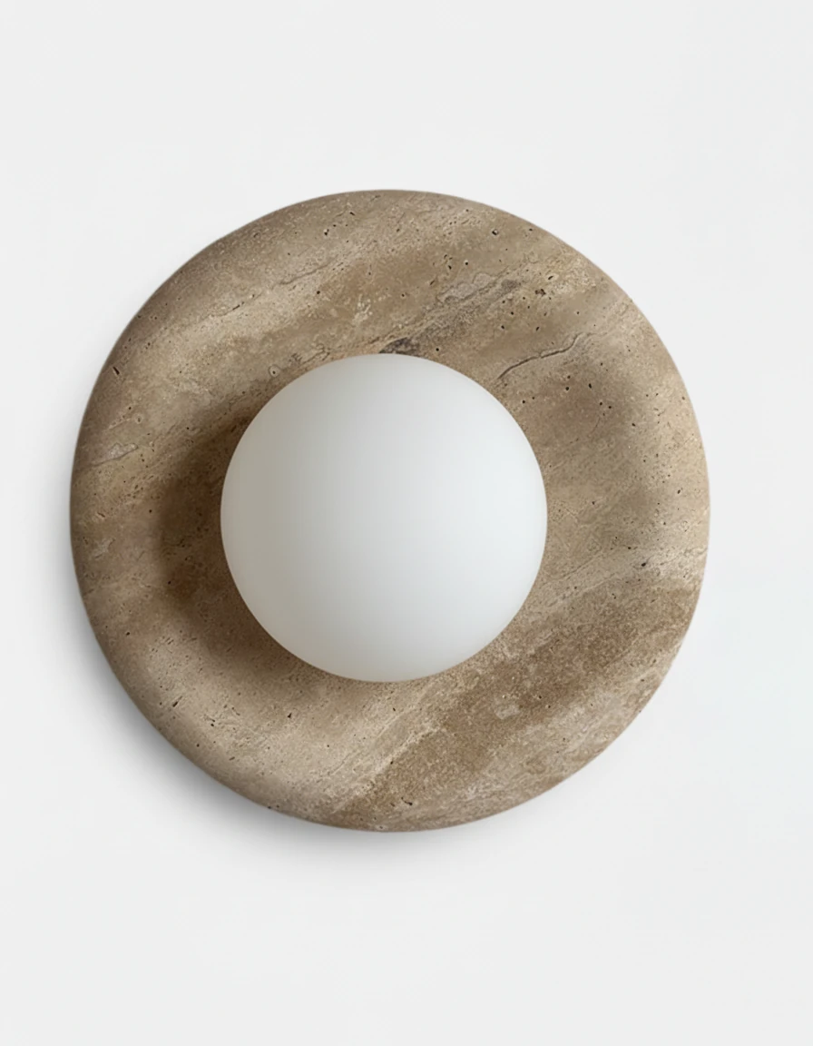 Alabaster wall sconce LATTE No.02 in Cream Travertine, beige porous stone ring around a white frosted globe