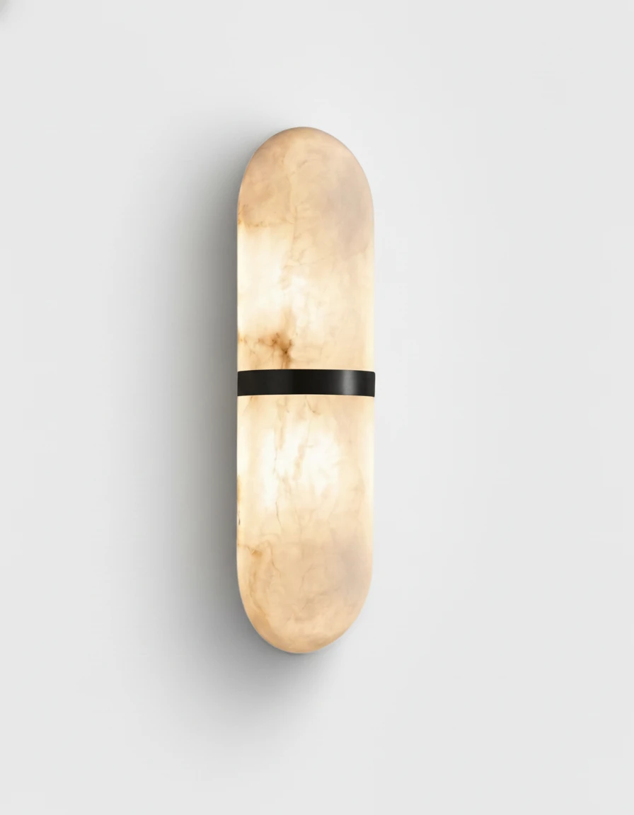 Alabaster wall sconce OLIVA No.01 in Black Band, lit alabaster capsule with a slim black band on a plain background