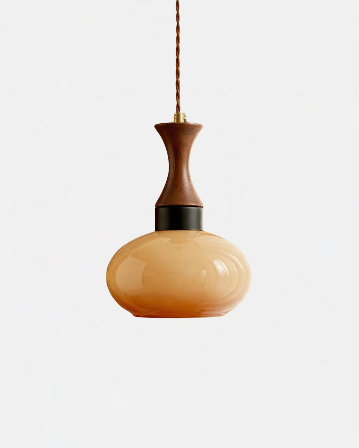 Amber glass pendant light OVIA No.04 in the Dome shape, rounded amber glass with a walnut neck, unlit
