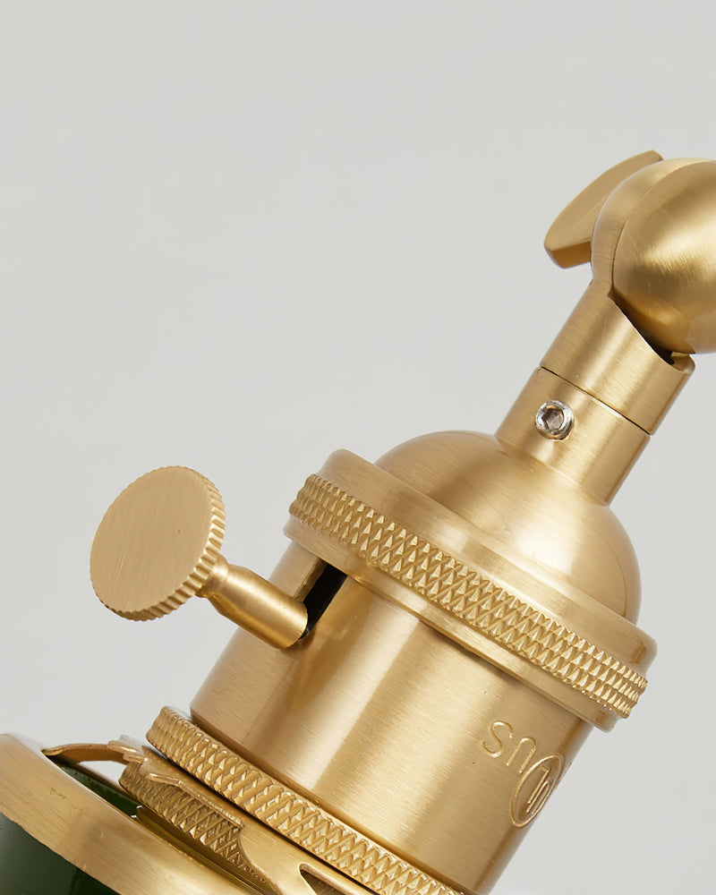 Close-up of the brass socket and knurled turn knob of the DALIA No.04 brass wall sconce