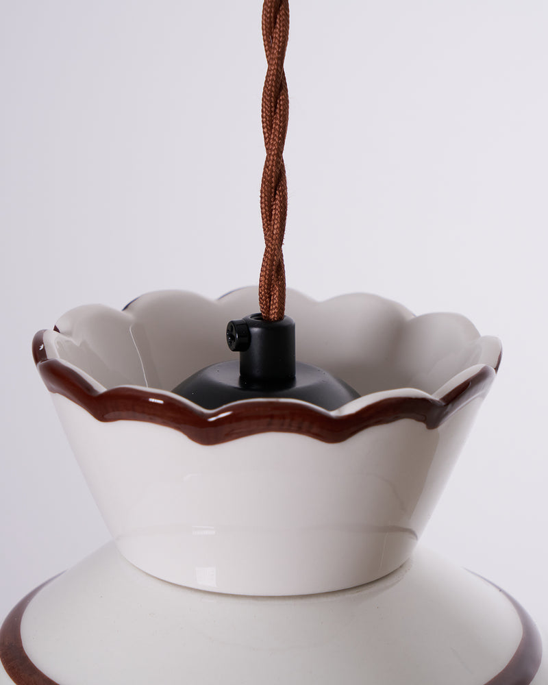 Close-up of the ceramic pendant light MELI No.04 top cup with twisted brown cord and socket