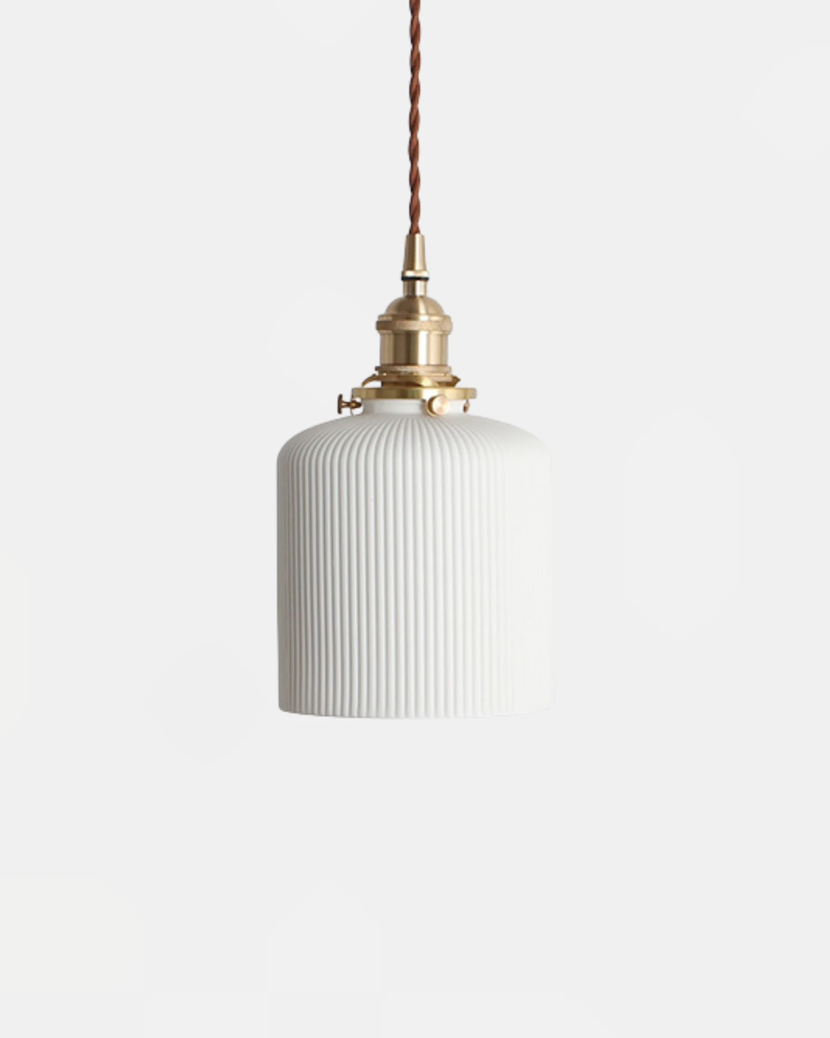 Ceramic pendant light SERA No.01 Fluted Cylinder, ribbed white shade on a brass socket and twisted cord, unlit
