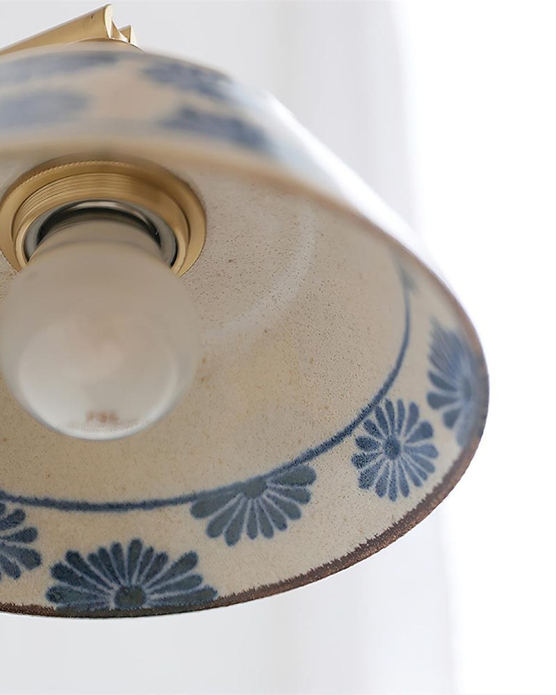 Close-up of the FIORA No.01 ceramic shade from below with the socket