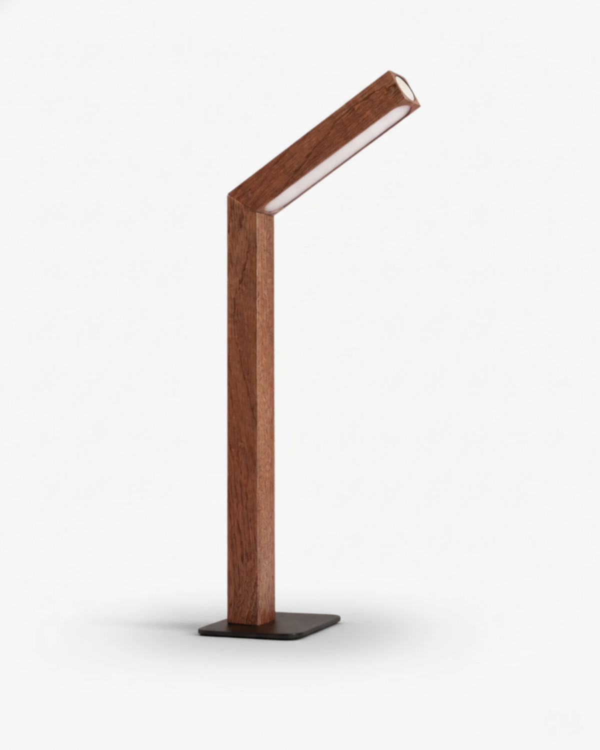 Cordless desk lamp RAMO No.01 in dark sapele, angled wooden arm with the LED strip lit