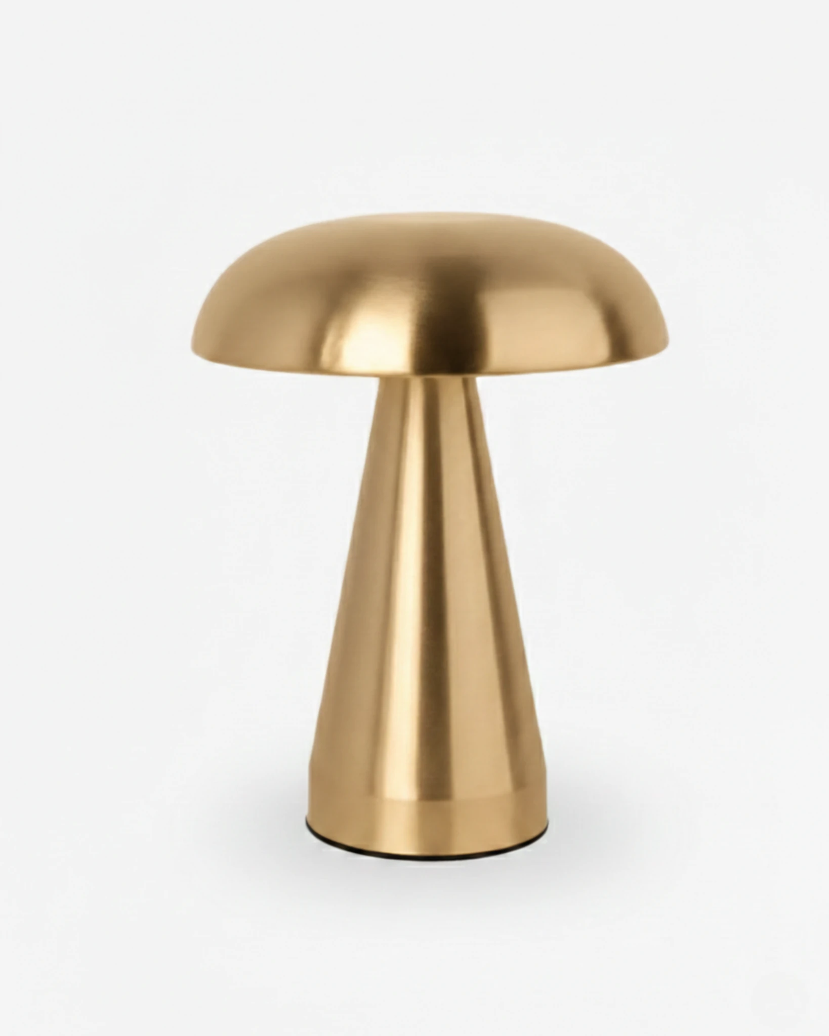 Cordless mushroom lamp LUMA No.04 in Brass, brushed gold mushroom cap and conical stem on a white background