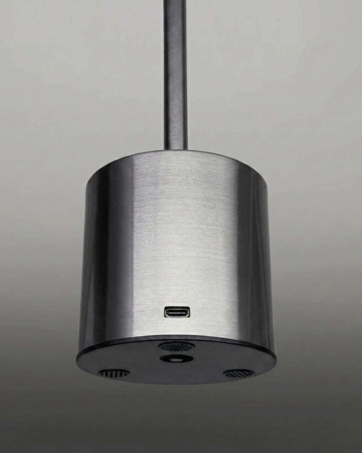 Close-up of the base of the RIETI No.01 cordless table lamp with its USB-C charging port and feet