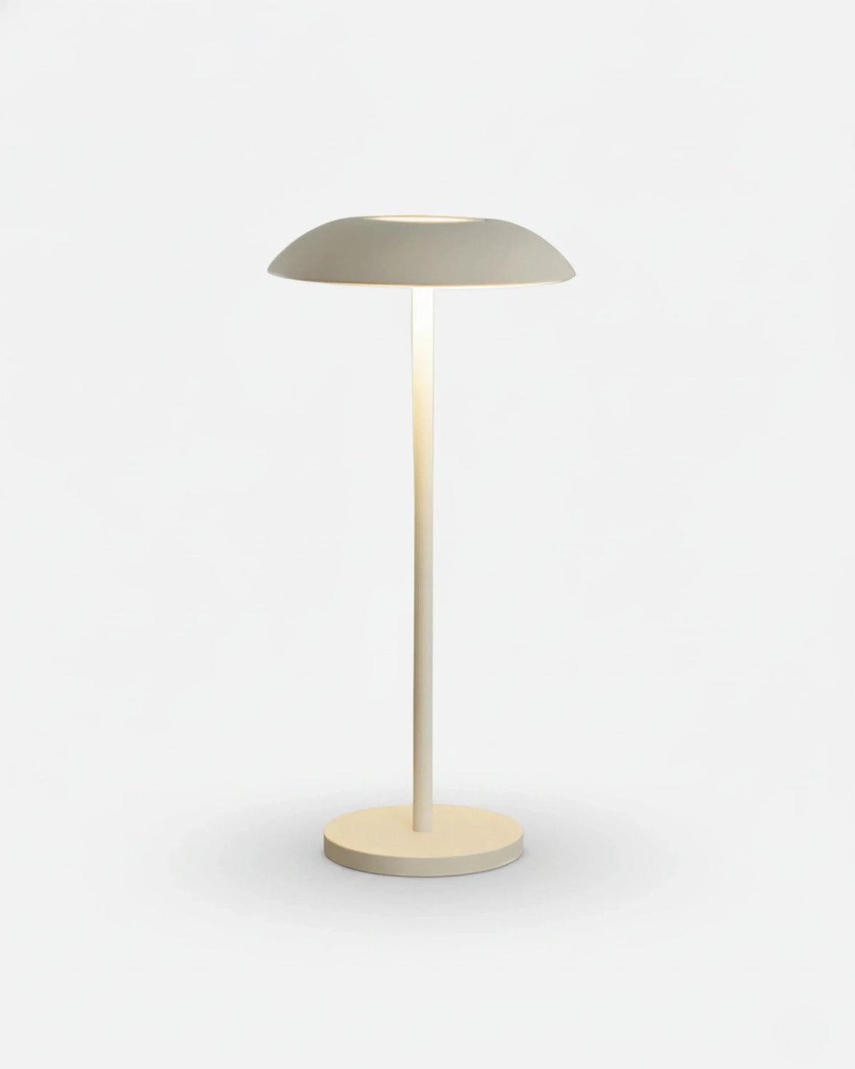 Cordless table lamp PESCARA No.01 in Pure White, dome shade glowing above a thin stem and round base