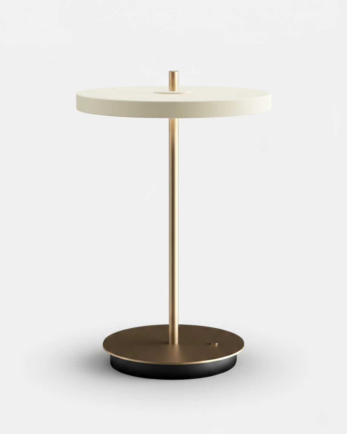 Cordless table lamp SALA No.01 in matte white, disc head on a brass stem with a flat brass base, unlit