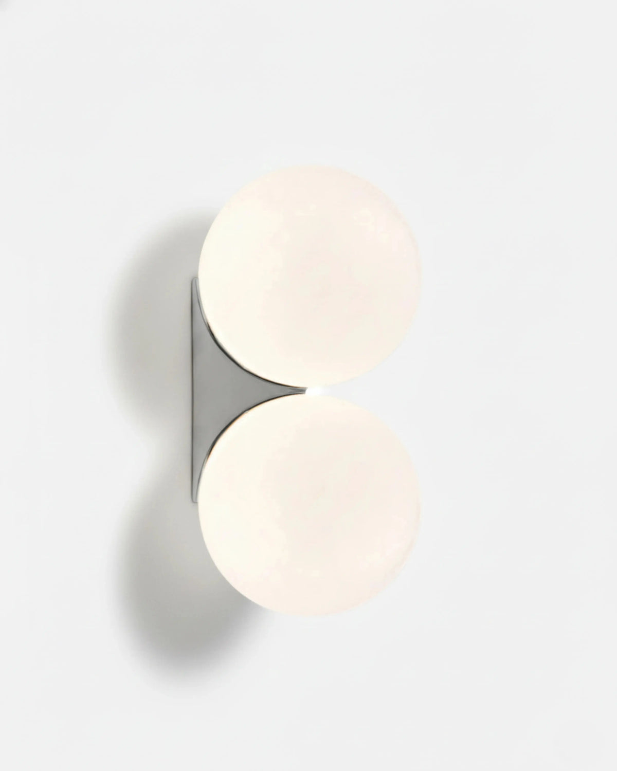 Globe wall sconce AURA No.03 double, twin opal globes glowing on a polished silver bracket