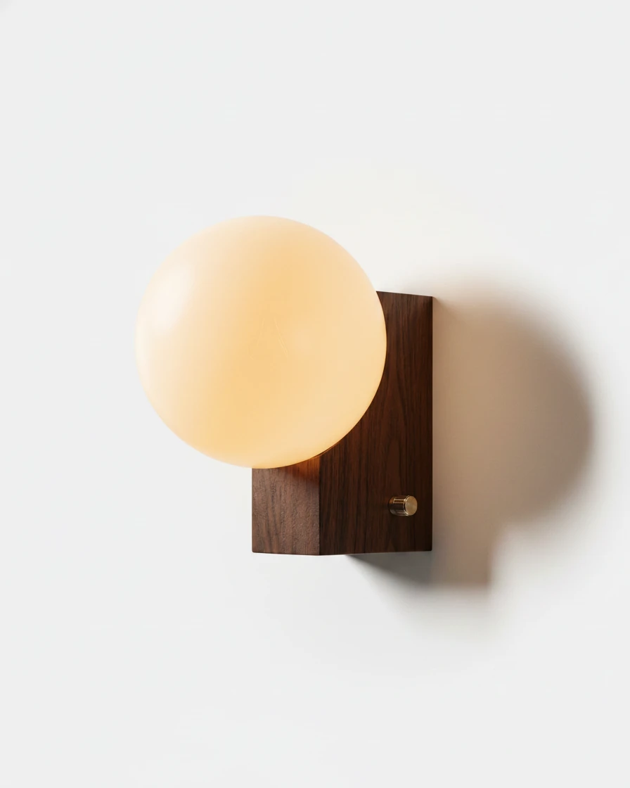 Globe wall sconce ELBA No.01 in walnut, opal glass globe mounted on a small walnut block