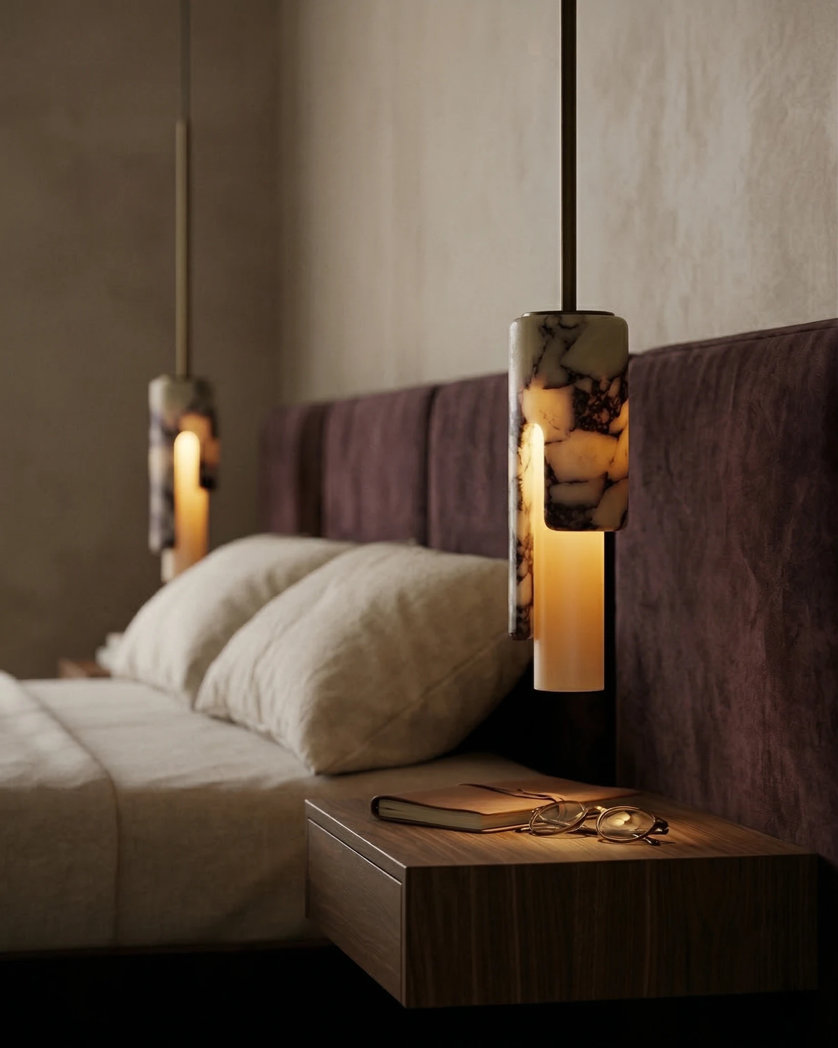 Marble pendant light PALERMO No.01 hanging lit over a walnut nightstand beside a burgundy upholstered headboard