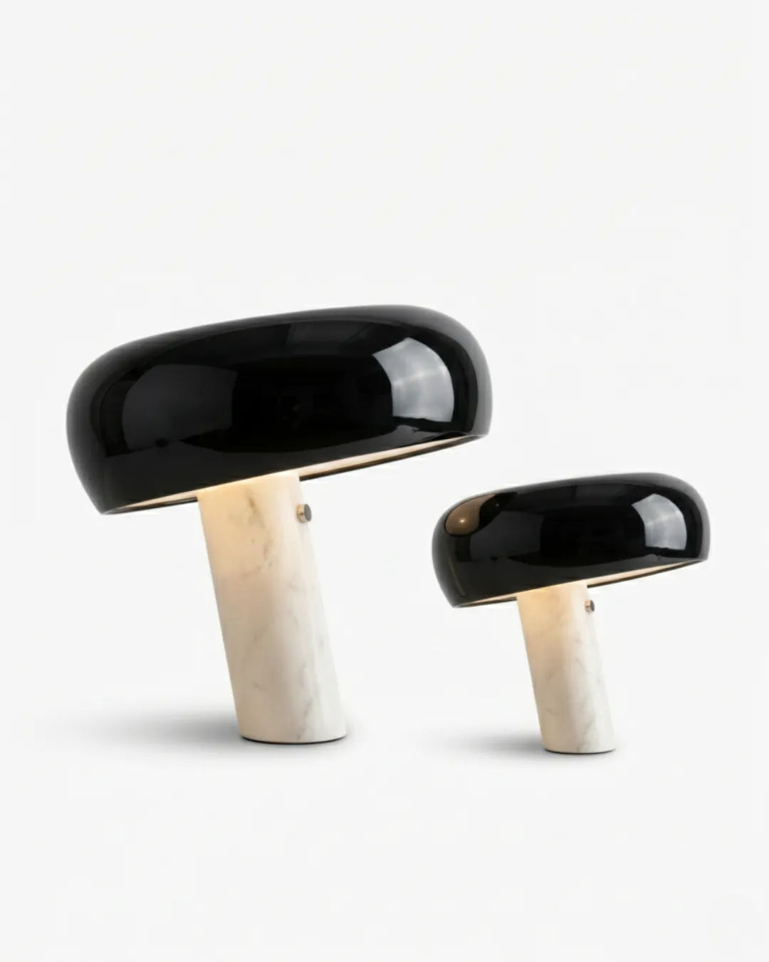 Set of two marble table lamps BRUNO No.01 in black, large and small sizes side by side on white marble bases