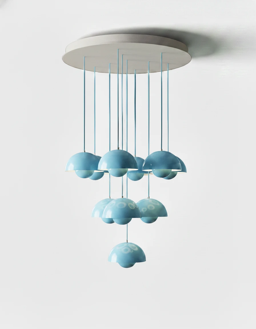 Modern chandelier FLORA No.01 Prelude, ten sky blue petal shades hanging in a cluster from a white disc canopy