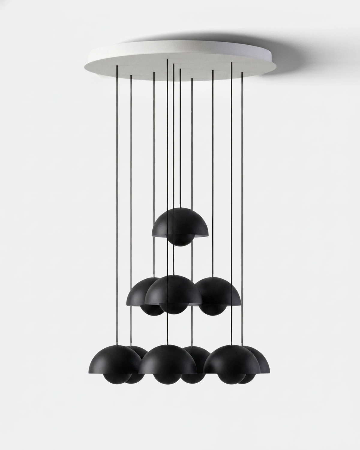 Modern chandelier FLORA No.01 Sonata in volcano black, glossy petal globes cascading from a round white canopy