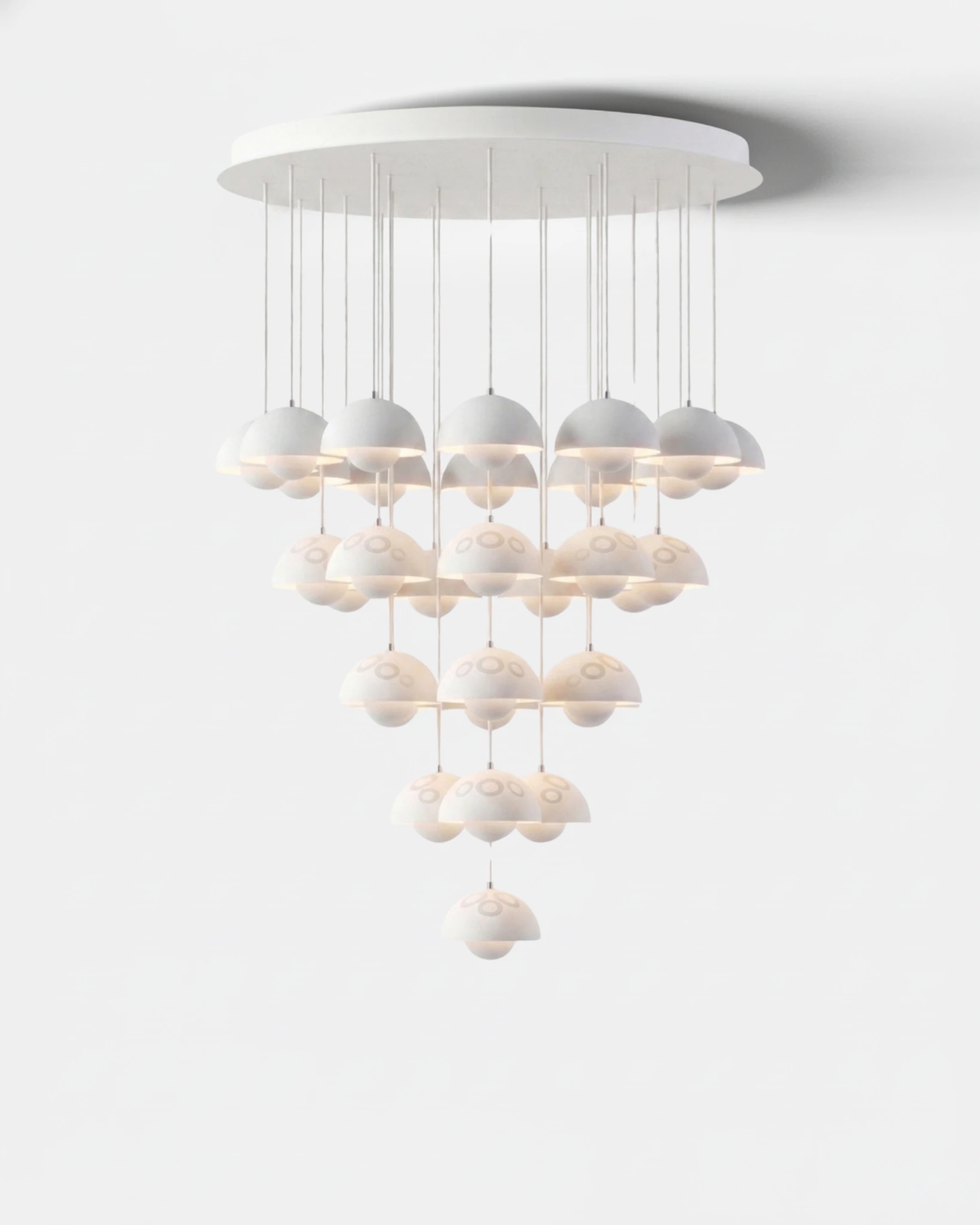 Modern chandelier FLORA No.01 Symphony with 31 white matte petal globes in a long stepped cascade