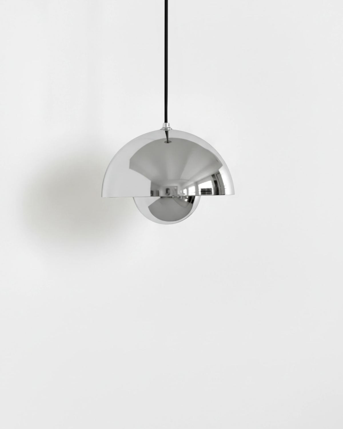 Small 6 in modern pendant light ALTO No.01 in polished chrome with a mirror-like shine, unlit