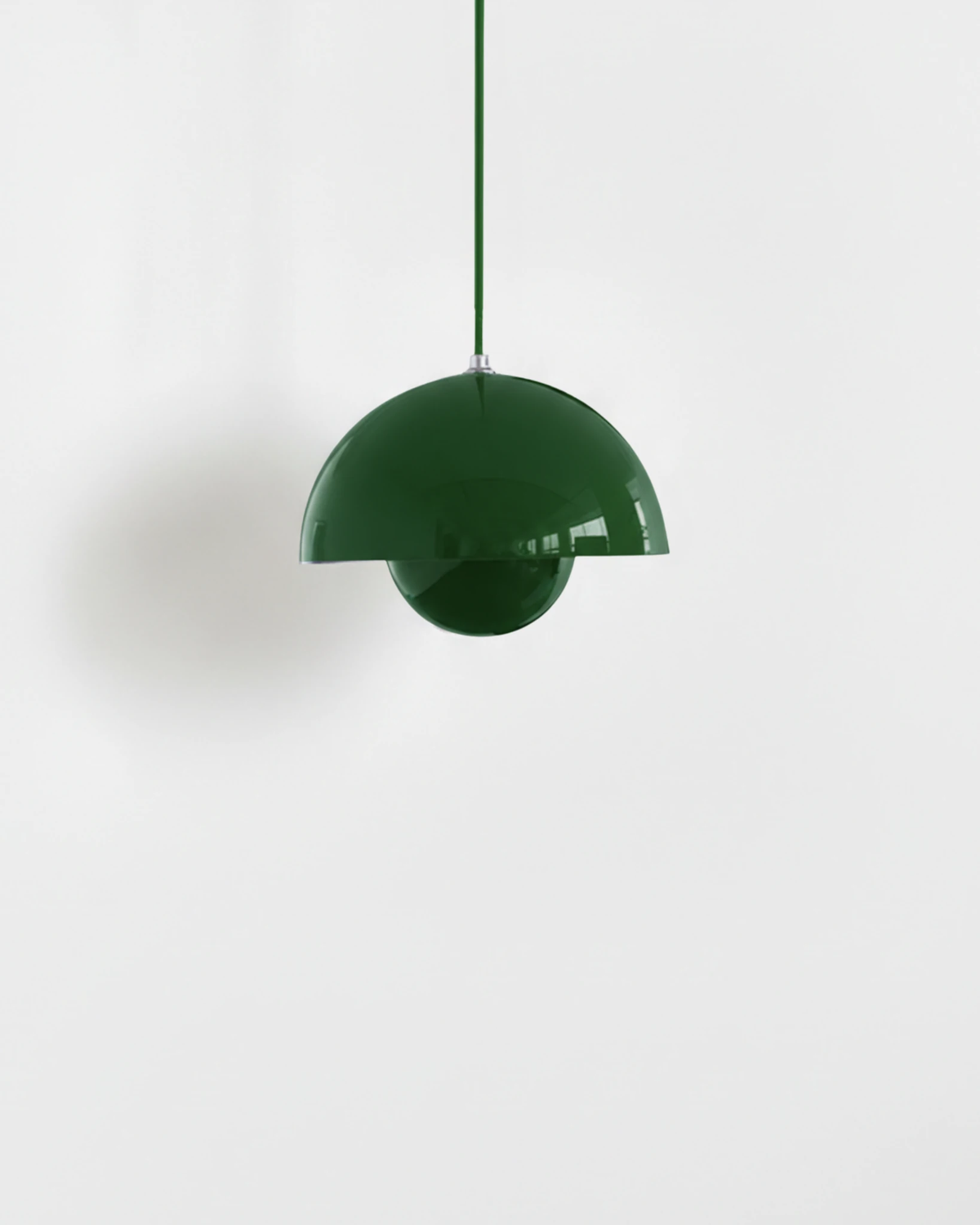 Small 6 in modern pendant light ALTO No.01 in forest green lacquer with a matching cord on white