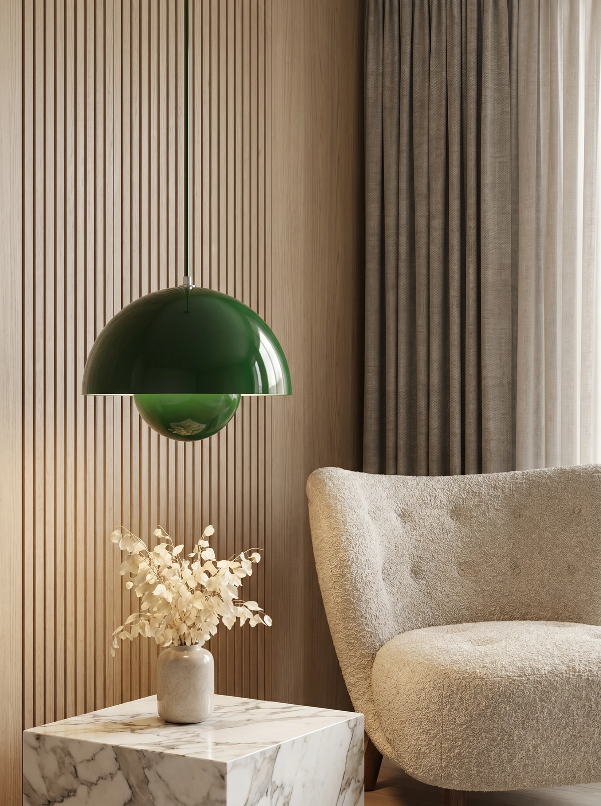 Modern pendant light ALTO No.01 in forest green hanging beside armchairs and a side table in a living room