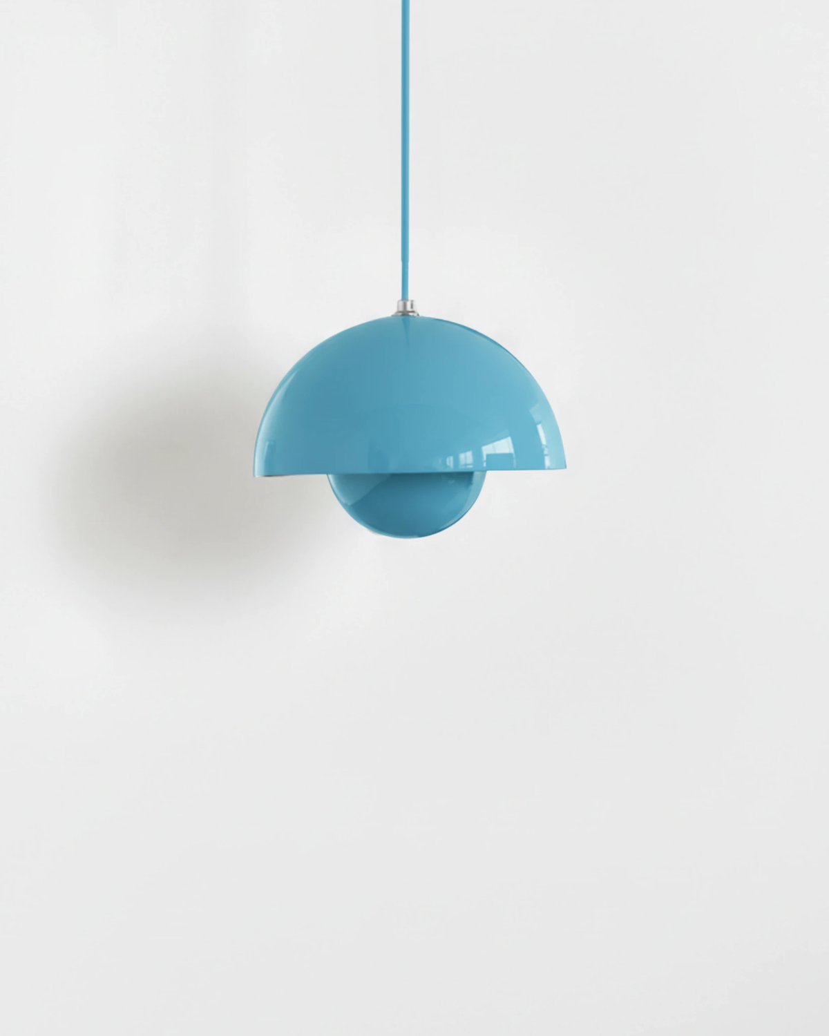 Small 6 in modern pendant light ALTO No.01 in sky blue lacquer, flowerpot silhouette, studio packshot