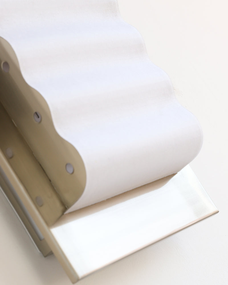 Close-up of the rippled acrylic diffuser and chrome edge of the MILANO No.01 modern wall sconce