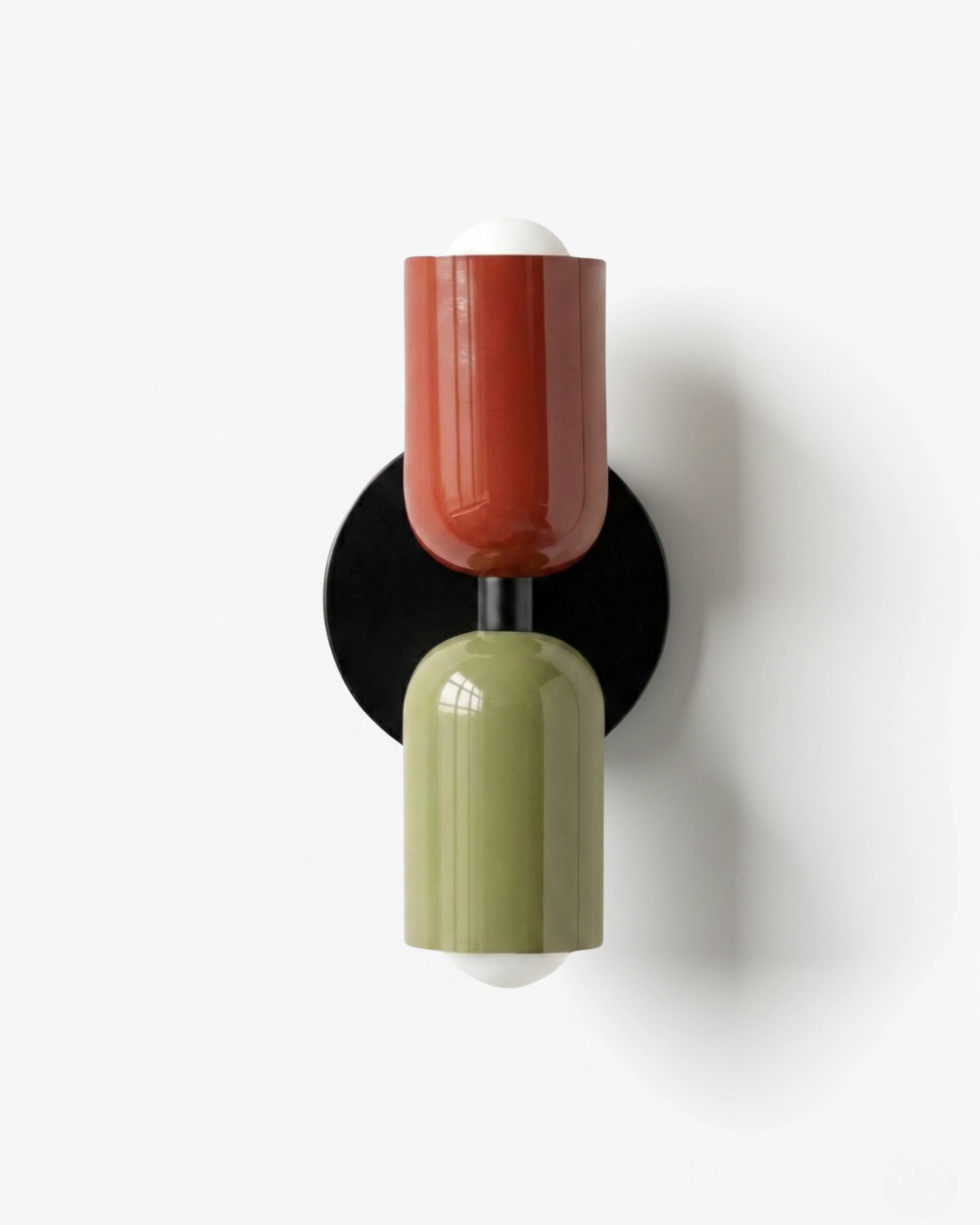 Modern wall sconce TORINO No.01 in Red & Green, red top capsule and olive bottom capsule on a black iron disc