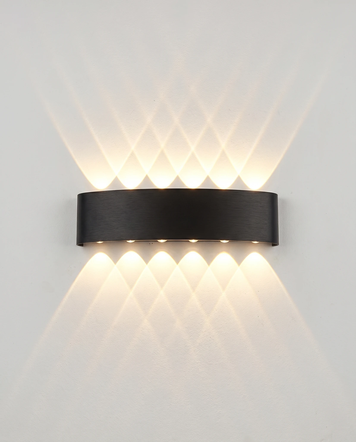 Outdoor wall sconce PALAZZO No.01 in matte black, widest bar with six LED beams above and below, lit