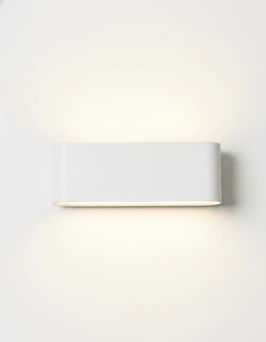 Outdoor wall sconce PISA No.01 large size in matte white, wide body switched on against a white wall