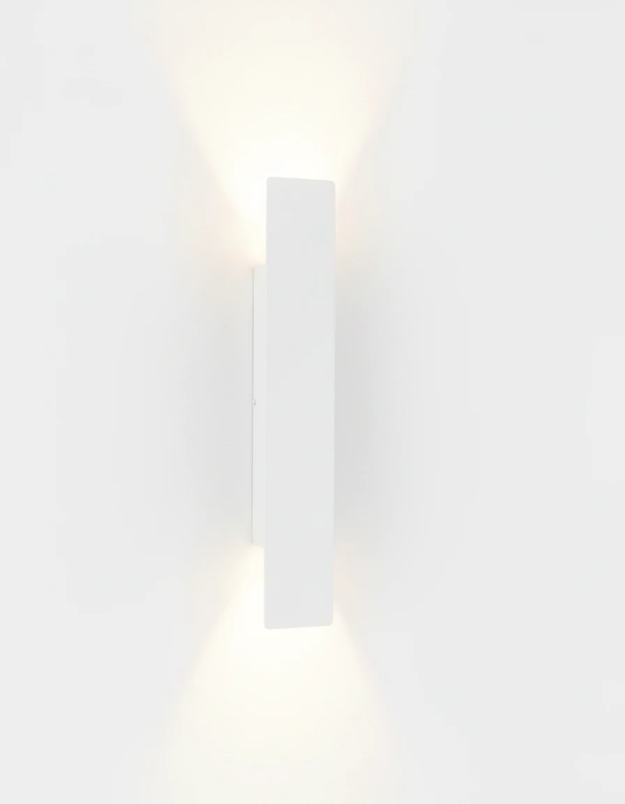 Outdoor wall sconce COLLE No.01 in matte white, Medium 16 in size with an up-down glow, switched on