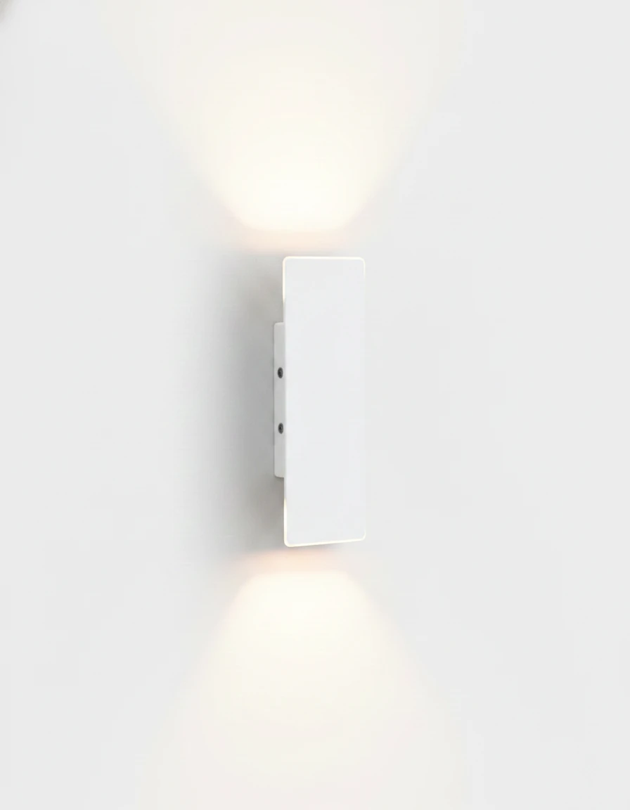 Outdoor wall sconce COLLE No.01, matte white Small 8 in linear bar lit up and down on a white wall