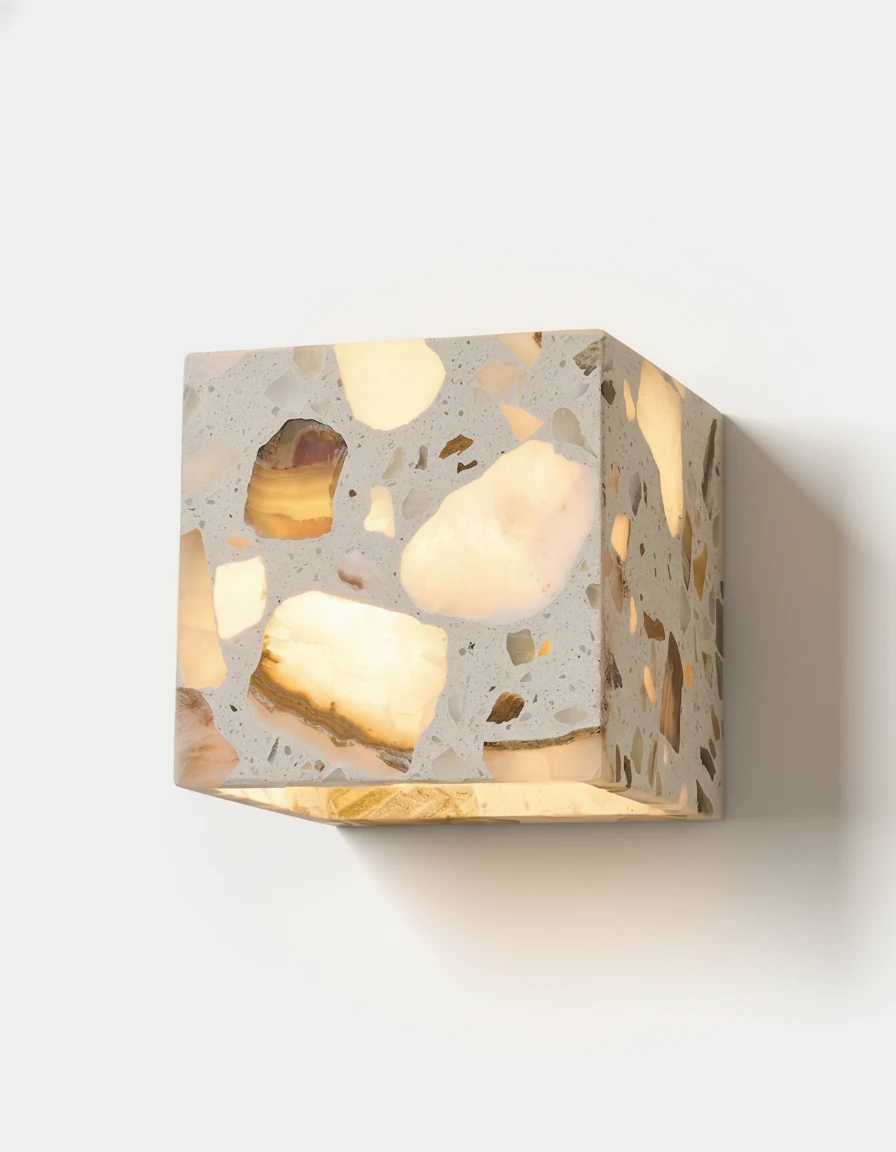 Terrazzo wall sconce INCA No.01 square, cube of gray terrazzo lit so the stone chips glow amber