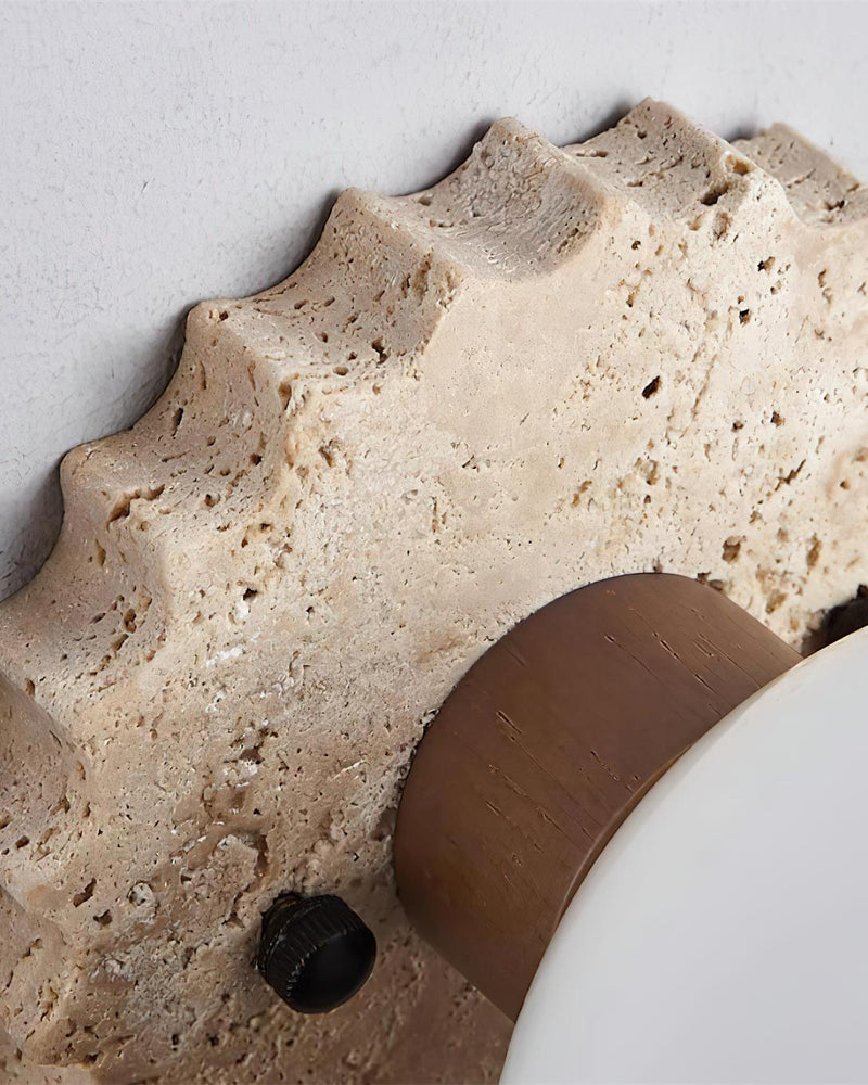 Close-up of the crenellated travertine edge and walnut ring of the LUNA No.07 travertine flush mount ceiling light