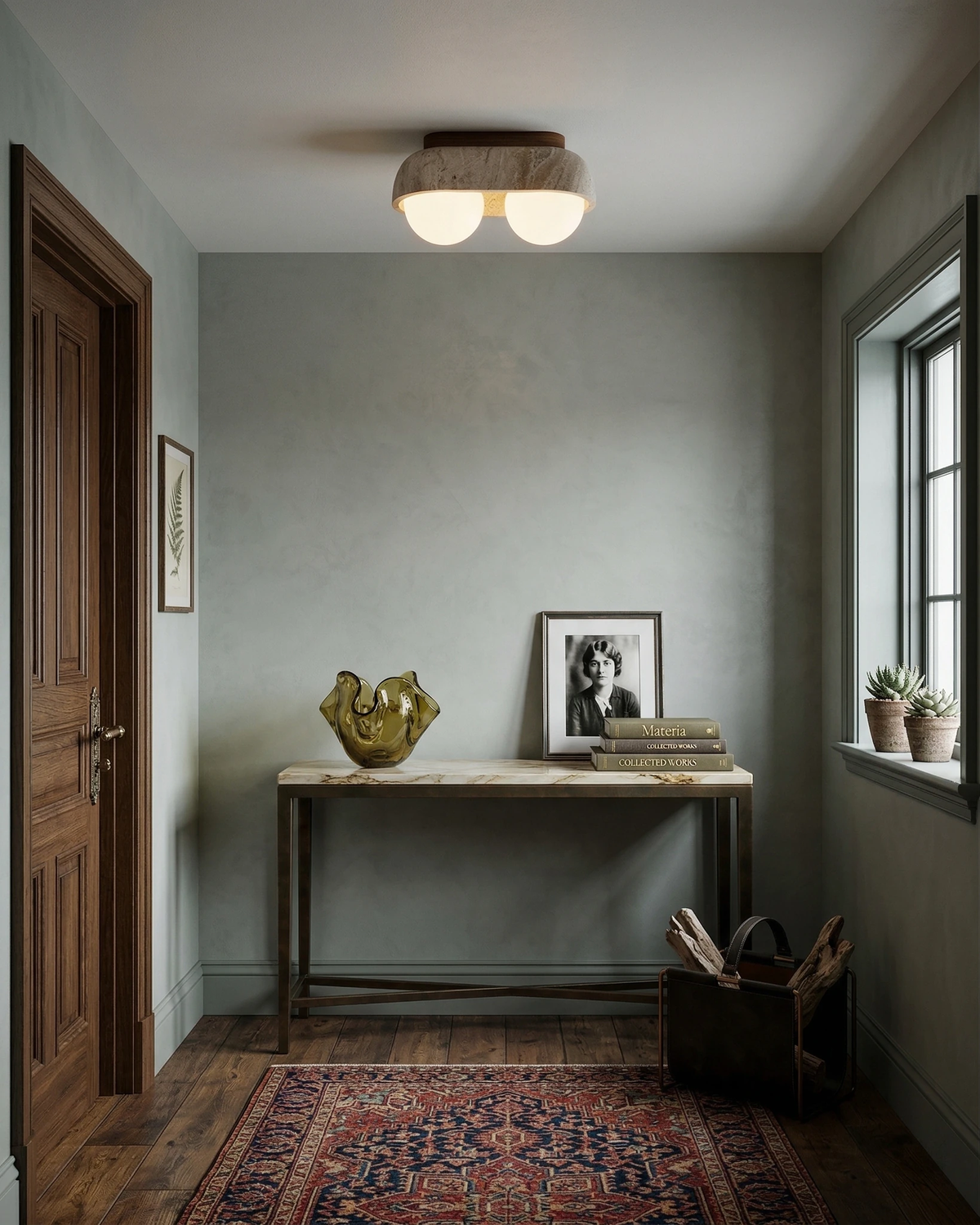 Travertine flush mount ceiling light PIETRA No.03, two-globe unit lit over an entryway console table beside a wood door