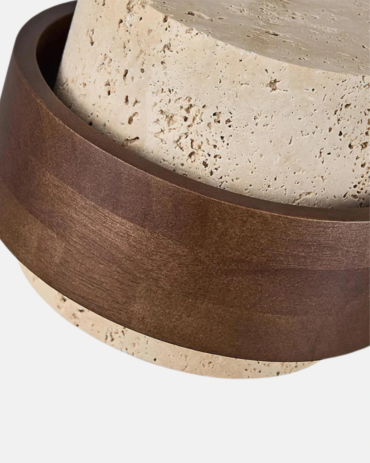 Close-up of the pitted travertine drum and walnut belt of the AVORIO No.05 travertine pendant light