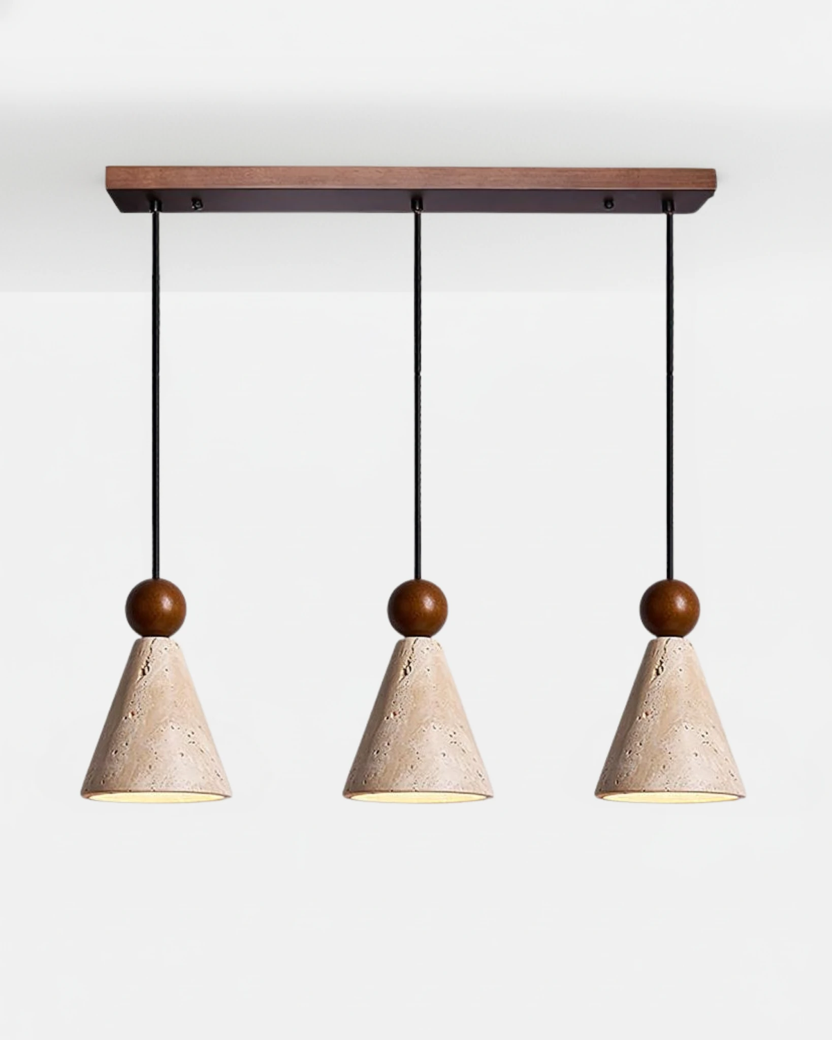 Linear three-head travertine pendant light PIRA No.01, three cones with walnut spheres on a walnut bar, unlit