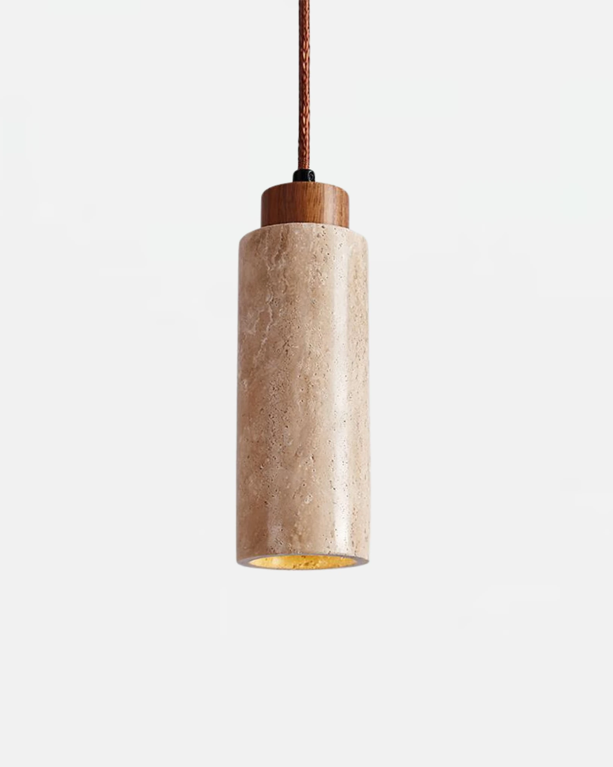 Travertine pendant light CORTO No.03 solo in cream travertine, cylinder on a walnut cap and braided cord, switched on