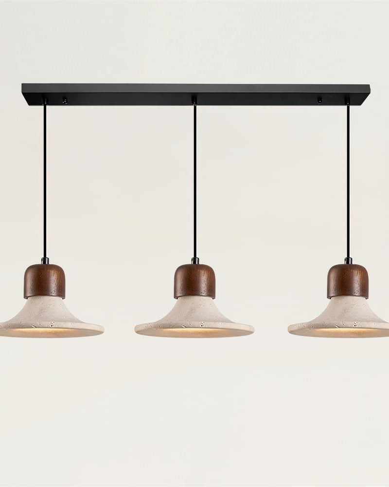 Linear three travertine pendant light SOVA No.03, three flared shades on a black bar, softly lit