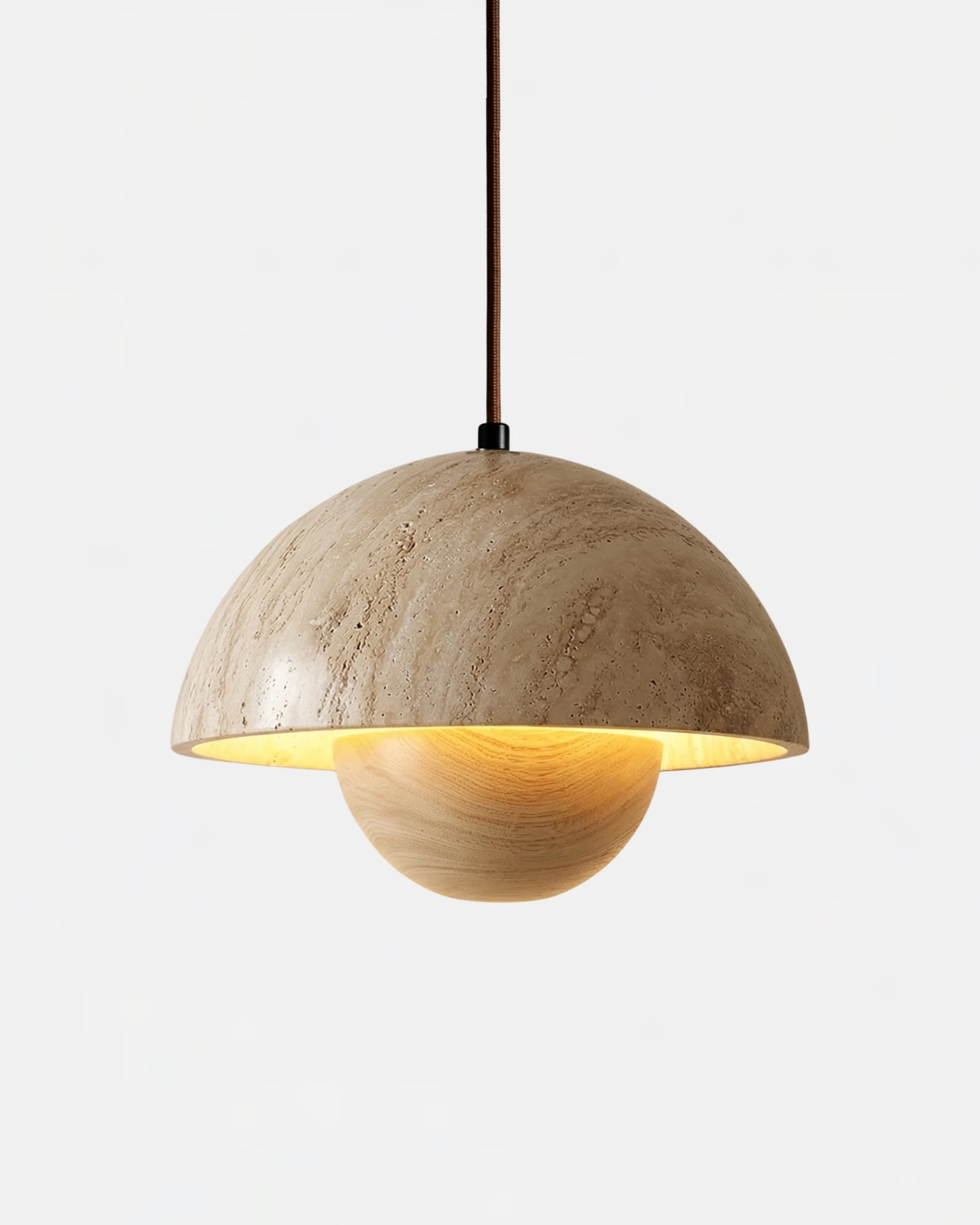 Travertine pendant light SOLE No.01 with natural wood sphere, lit dome on a black cord, white background