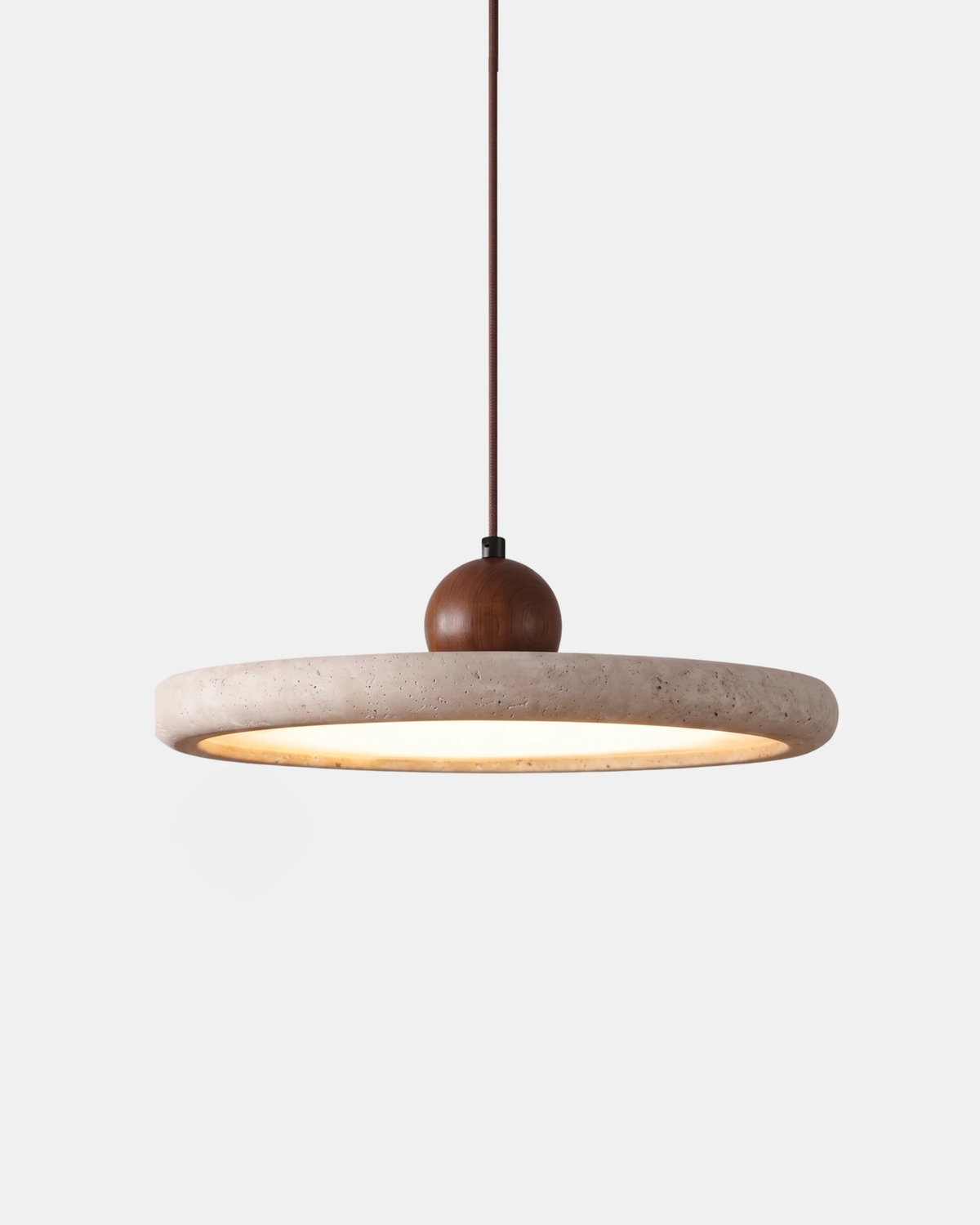 Travertine pendant light TONDO No.02, single 30 cm stone disc with a walnut ball and the LED lit underneath