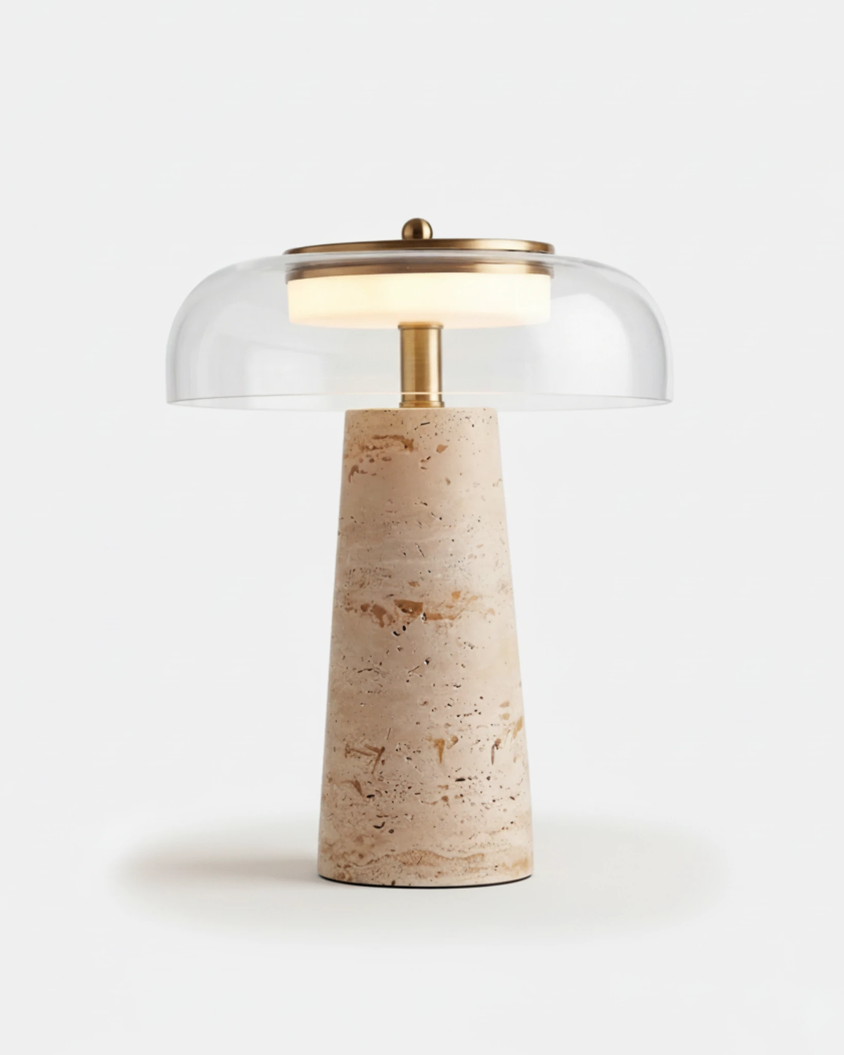 Travertine table lamp MORA No.01 in Travertine and Clear Glass, tapered stone base with a lit dome shade and brass collar