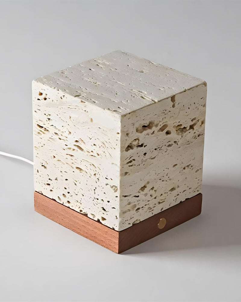 Travertine table lamp MORA No.05, cream travertine cube on a walnut base with a white cord, unlit