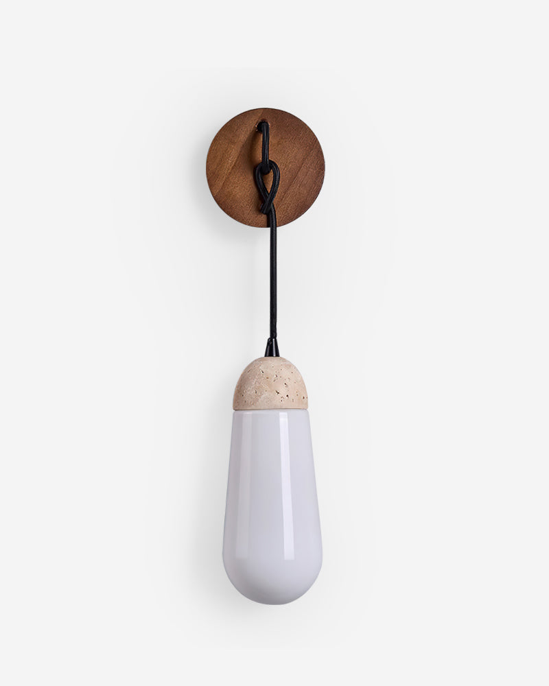 Travertine wall sconce CORTO No.02, opal teardrop with travertine cap on a knotted black cord and walnut canopy