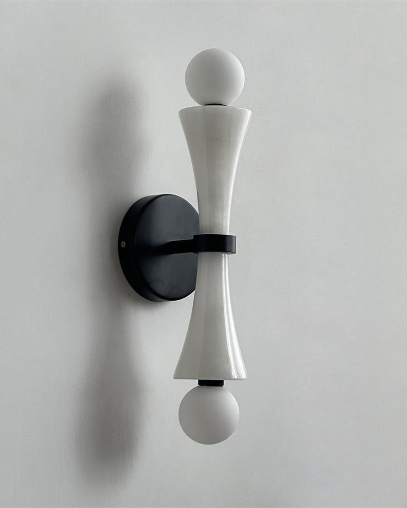 Travertine wall sconce VETTA No.01 in white jade, pale stone hourglass body with two opal globes, unlit