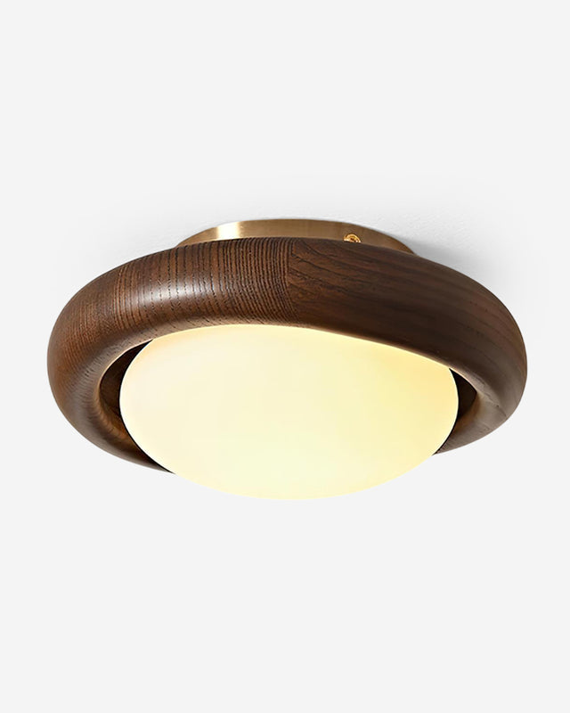 Wood flush mount ceiling light MURA No.01 in Dark Wood, walnut halo ring around a glowing opal dome with brass trim