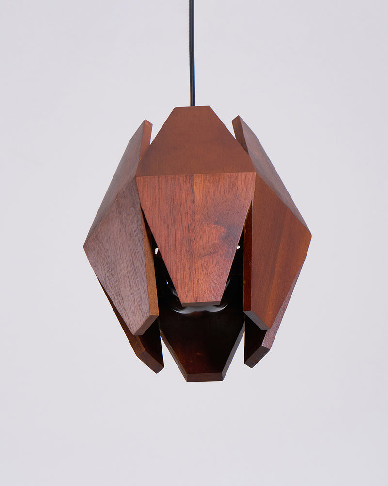 Wood pendant light ORBIT No.01 seen from below, unlit walnut fins around a dark hollow core